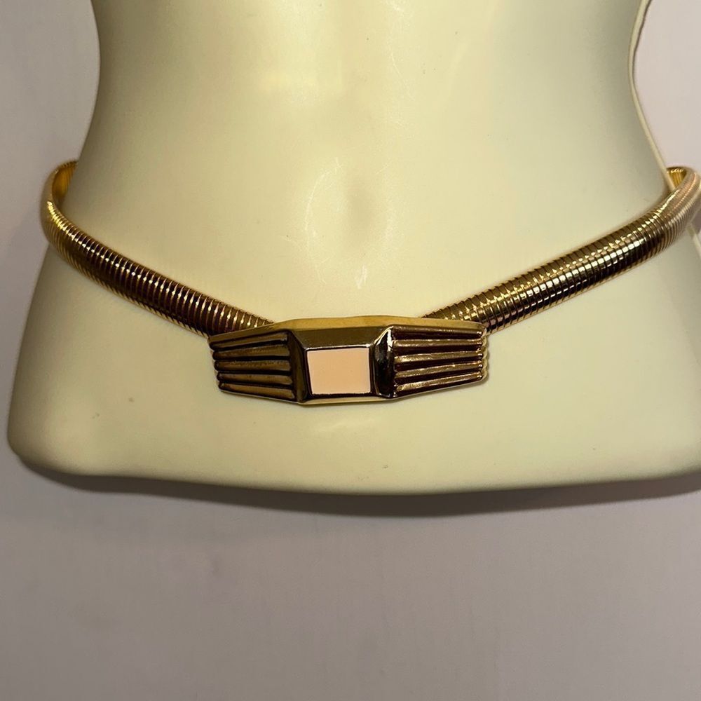 Vintage 80s shiny gold serpentine belt with unique rectangular buckle